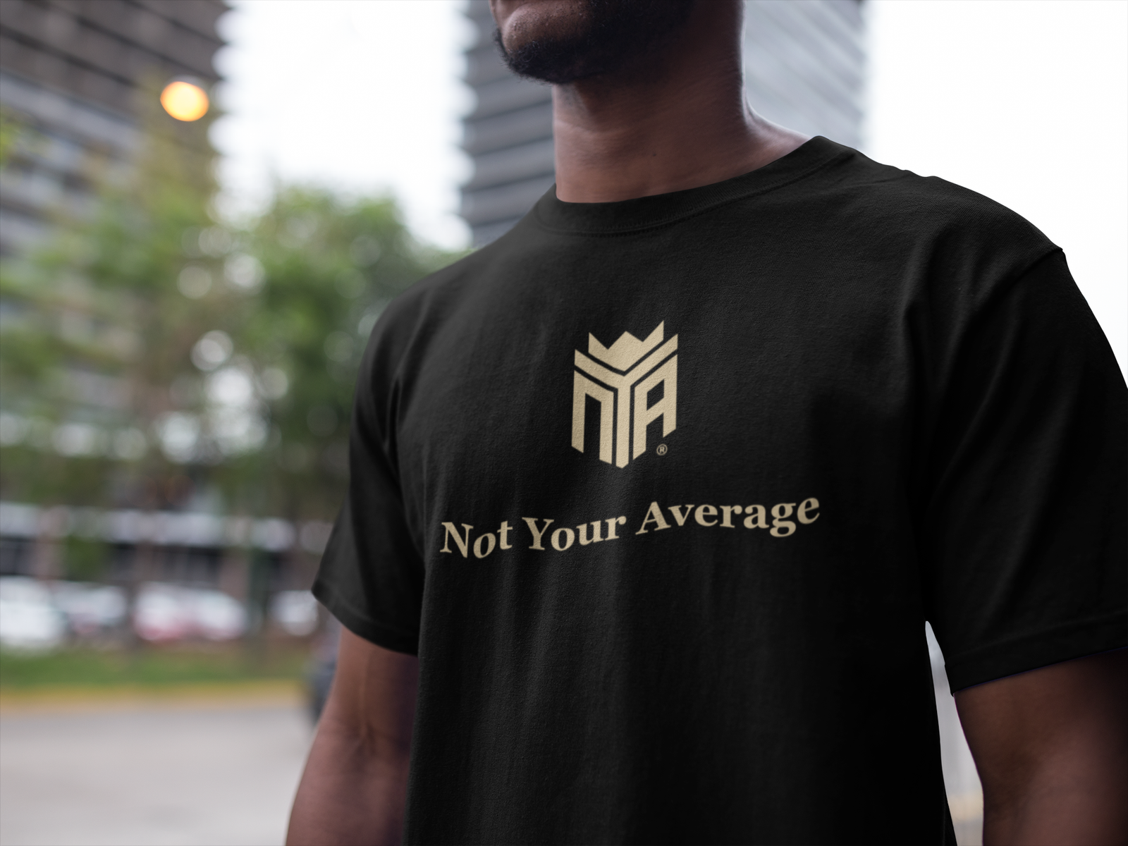 black-man-wearing-a-t-shirt-mockup-at-the-city-a16894